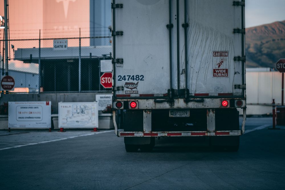 Commercial truck on highway representing primary liability coverage